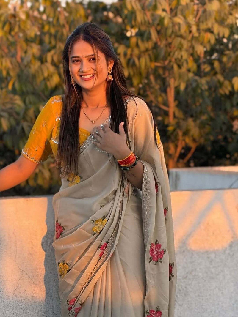 Graceful Cream Saree with Floral Work & Designer Yellow Blouse