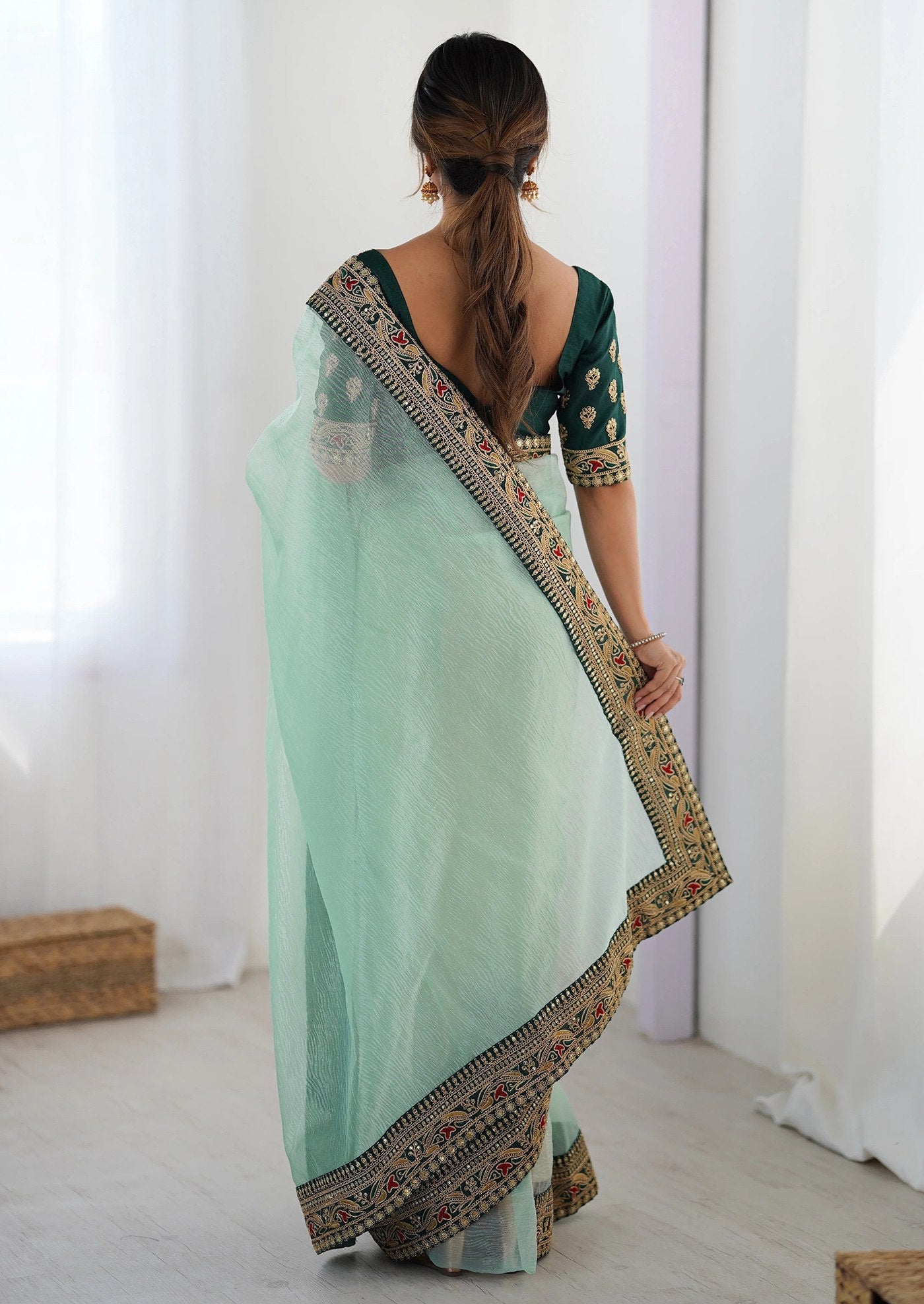 Stylish Mint Green Saree with Heavy Embroidered Lace Border