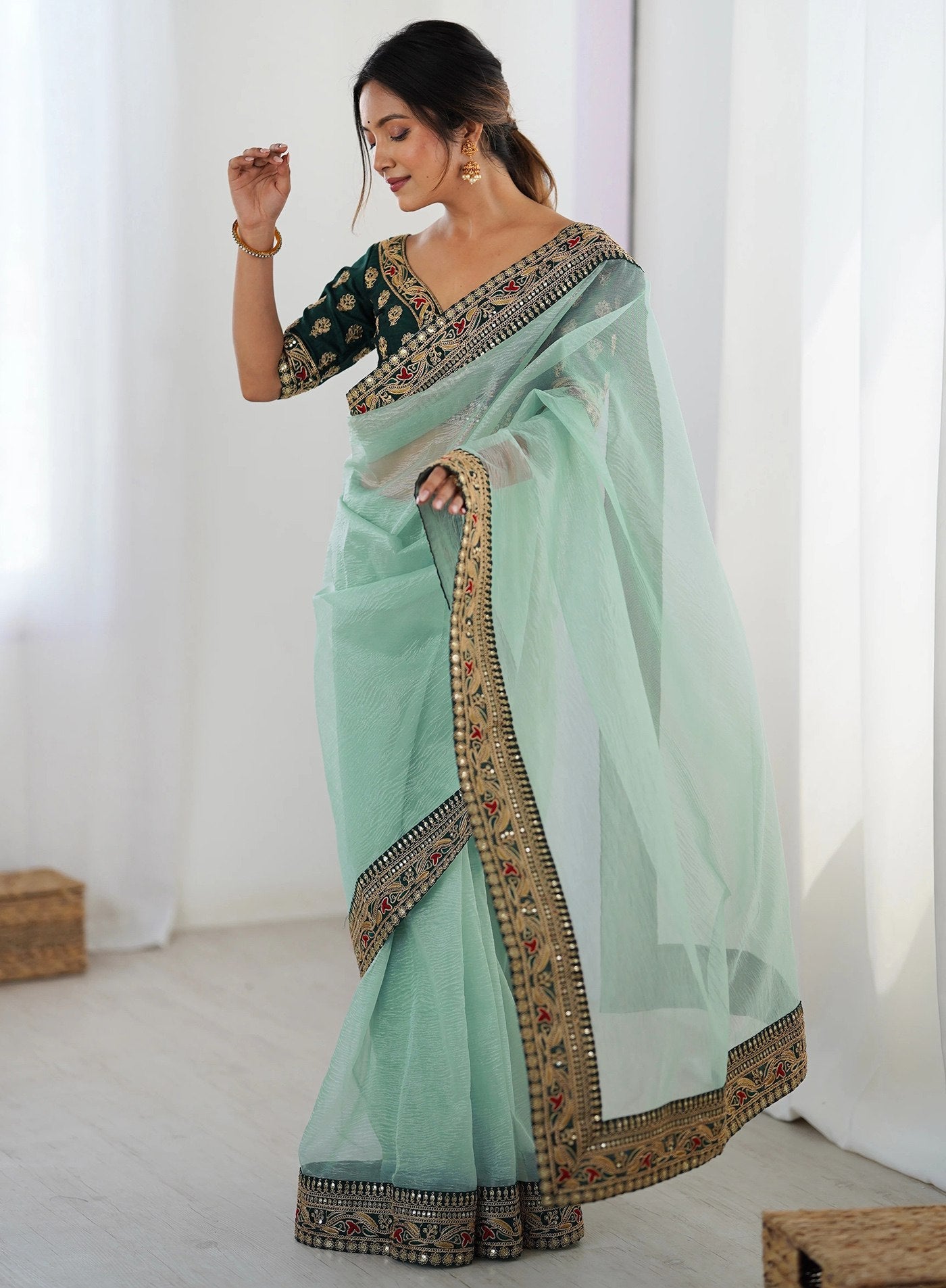 Stylish Mint Green Saree with Heavy Embroidered Lace Border