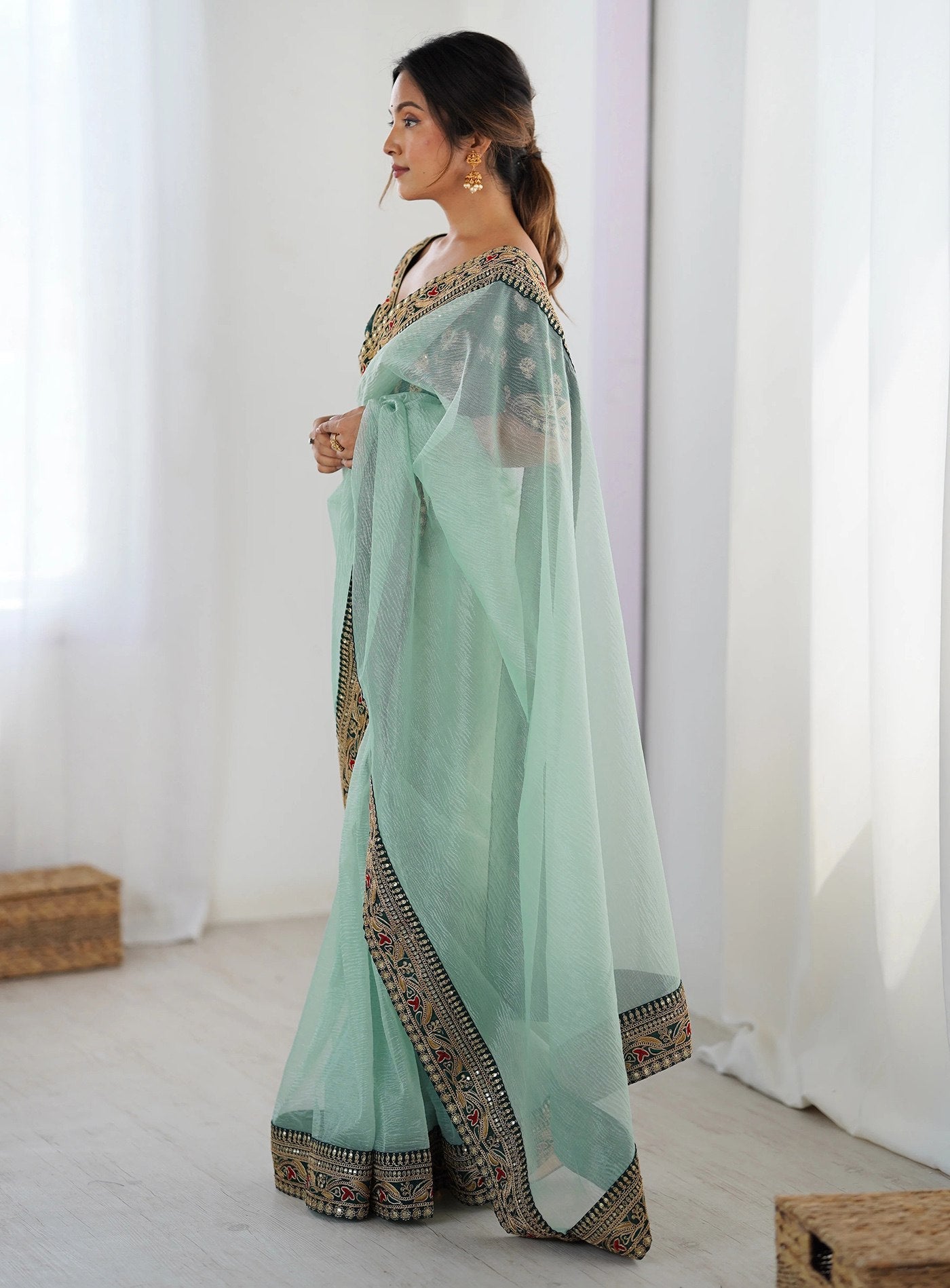 Stylish Mint Green Saree with Heavy Embroidered Lace Border