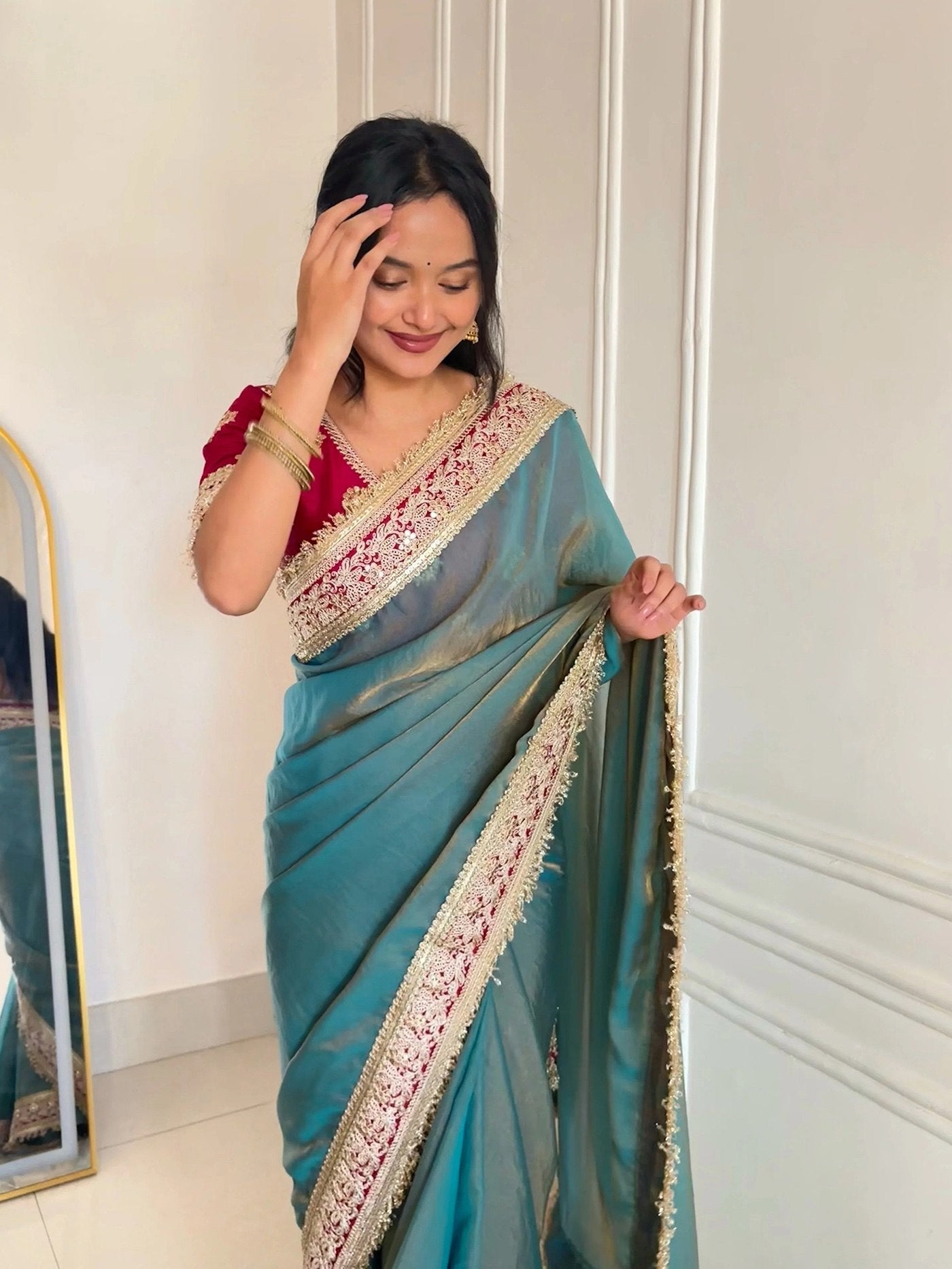 Elegant Teal Designer Saree with Heavy Embroidered Border & Red Blouse